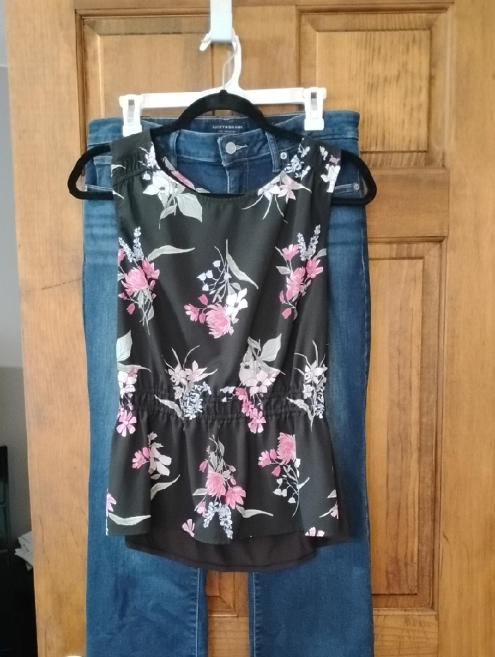 Super Cute a new day Black Floral Peplum Camisole with Pink and White Flowers.